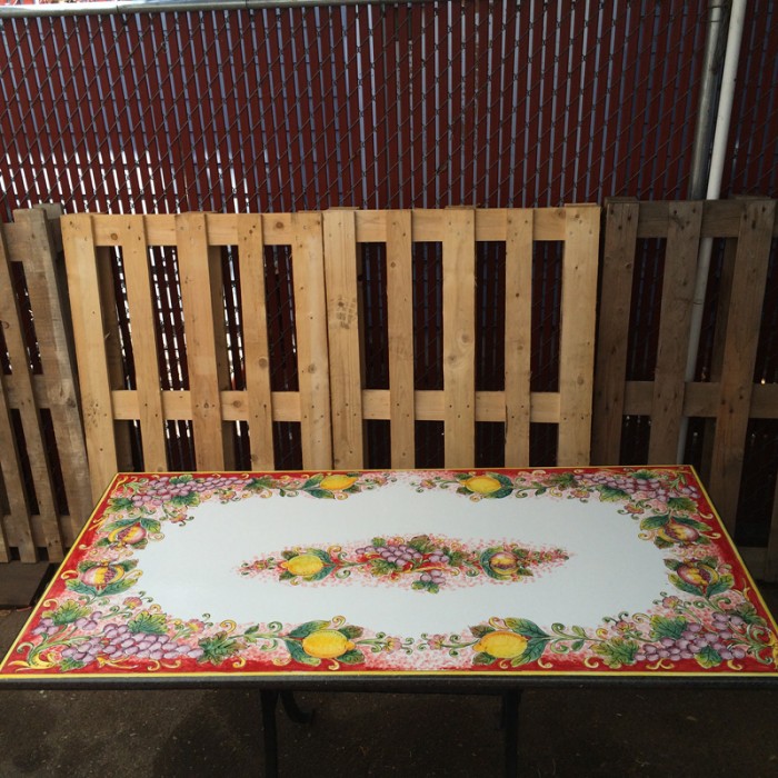 55'' x 27.5" Italian Volcanic Table - Mixed Fruit on Red